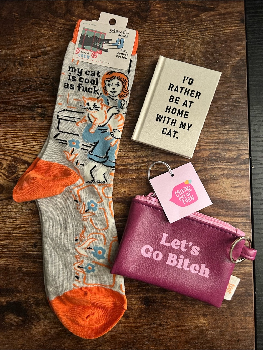Cute gifting bundle! Novelty socks, penny key ring, fun tiny notebook/desk decor